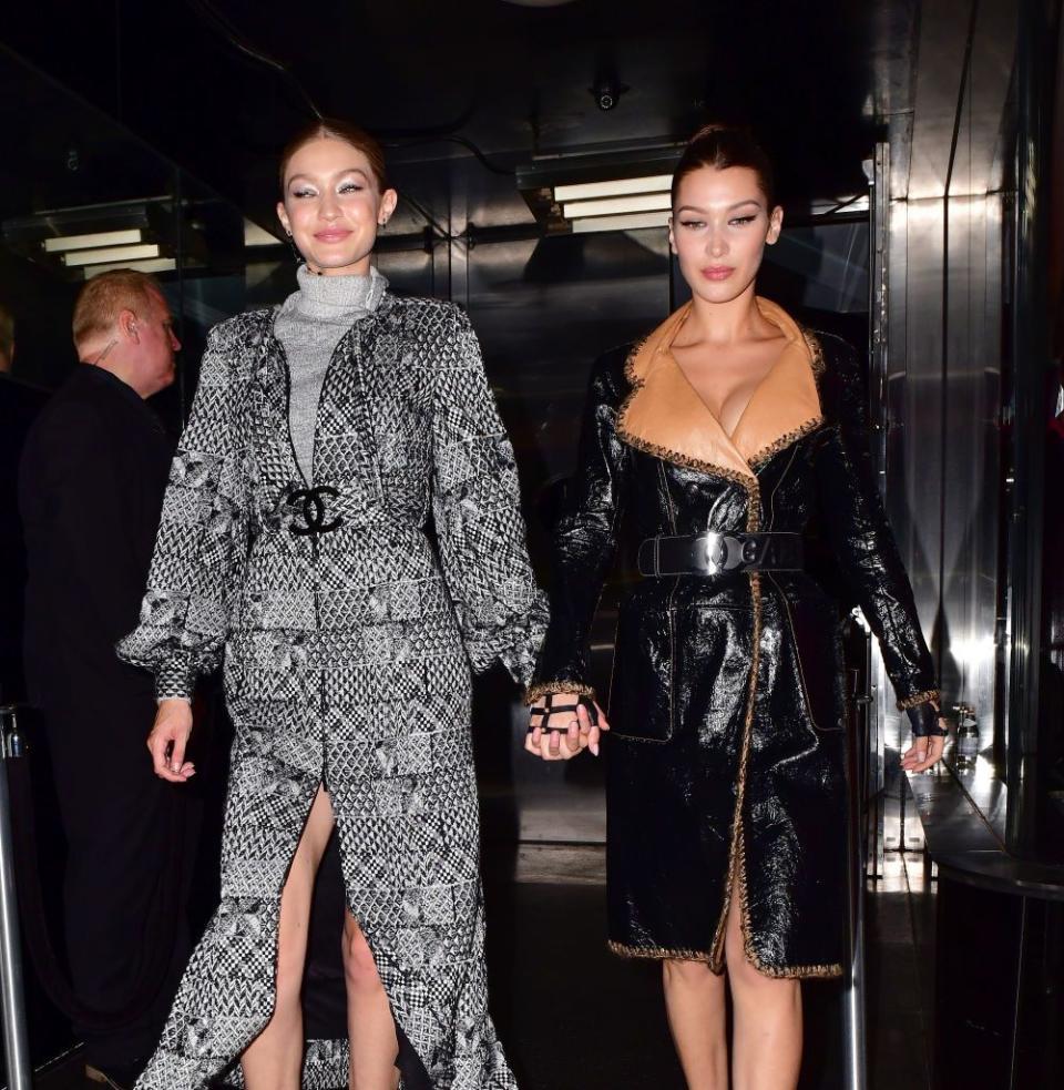 <p>Gigi and Bella Hadid prove they're stylish sisters wearing coats from Chanel's pre-fall 2017 collection. Both donned logo belts, Gigi opting for a gray tweed jacket, while Bella went with black lambskin.<br></p>