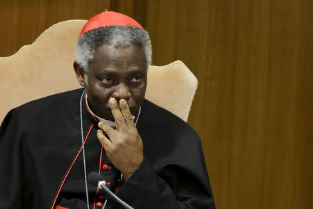 FILE PHOTO: Cardinal Peter Turkson attends a news conference for the presentation of Pope Francis' new encyclical titled "Laudato Si (Be Praised), On the Care of Our Common Home", at the Vatican June 18, 2015. REUTERS/Max Rossi -