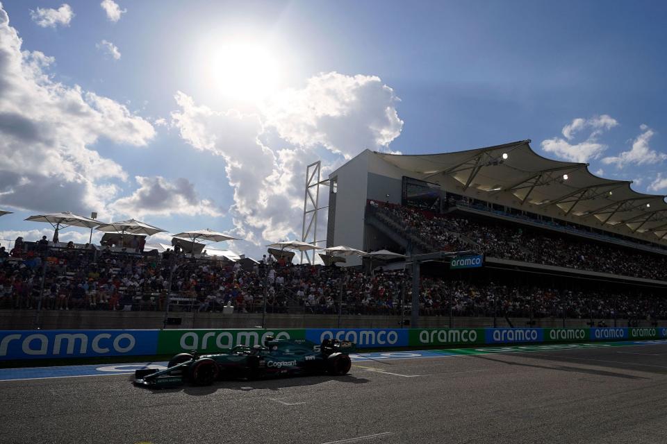 Aston Martin's German driver Sebastian Vettel races down the main straightaway during the qualifying session at the Circuit of The Americas in Austin, Texas