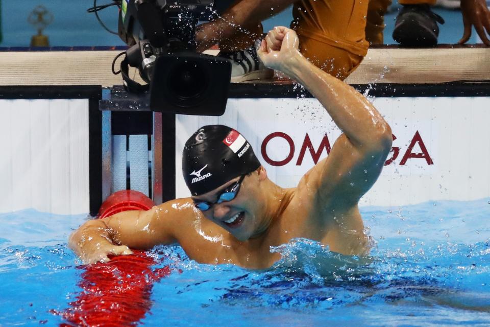 <p>Joseph Schooling of Singapore celebrates winning gold in the Men’s 100m Butterfly Final on Day 7 of the Rio 2016 Olympic Games at the Olympic Aquatics Stadium on August 12, 2016 in Rio de Janeiro, Brazil. (Photo by Dean Mouhtaropoulos/Getty Images) </p>
