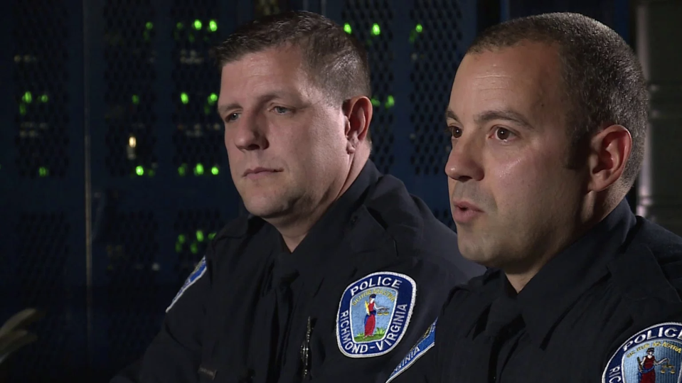 Officers Aaron Henning, left, and Daniel Raines reflect on the incident that led to their receiving a Valor Award. (Photo: WTVR)