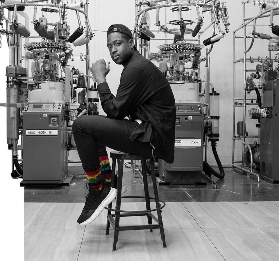 Does basketball star Dwyane Wade seem very focused and pensive in this pic? Well, there's a good reason: He's trying to figure out a way to make <a href="https://www.pkwy.com/products/special-delivery-3pk-bundle" target="_blank" rel="noopener noreferrer">his colorful socks even more colorful</a>. As if that's possible.