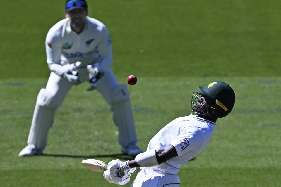 South Africa's Tshepo Moreki avoids a bouncer while batting against New Zealand on the second day of their cricket test in Hamilton, New Zealand. Wednesday, Feb. 14, 2024. (Andrew Cornaga/Photosport via AP)