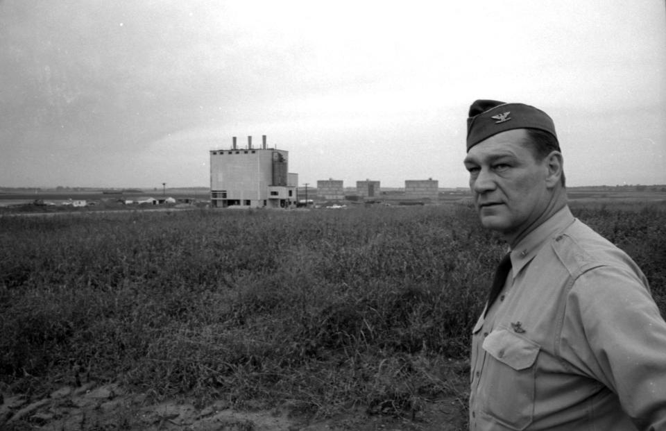 Col. Charles E. Lancaster, commander of Bong Air Force Base in Kenosha County, is shown looking at the heating plant, one of the few buildings that had been completed on the 5,400-acre site, in late September 1959. Construction of the air base was halted Oct. 2, 1959, four years and more than $15 million after the project was announced.