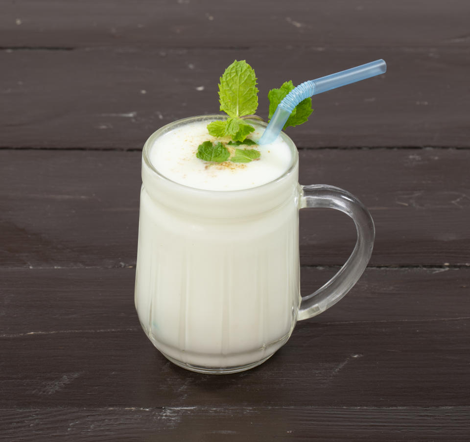 Fresh Summer Buttermilk drink. Made of yogurt or chaas on wooden background