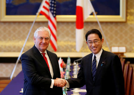 U.S. Secretary of State Rex Tillerson (L) shakes hands with Japan's Foreign Minister Fumio Kishida before their meeting at the foreign ministry's Iikura guest house in Tokyo, Japan, March 16, 2017. REUTERS/Toru Hanai