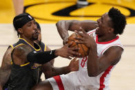 Los Angeles Lakers guard Kentavious Caldwell-Pope, left, blocks the shot of Houston Rockets forward Jae'Sean Tate during the second half of an NBA basketball game Wednesday, May 12, 2021, in Los Angeles. (AP Photo/Mark J. Terrill)