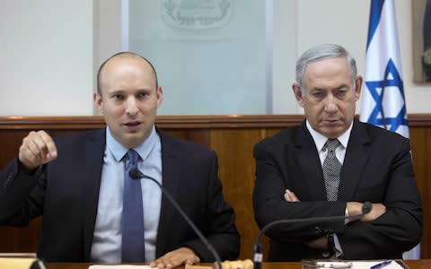 Naftali Bennett (right), the leader of the Jewish Home, wants elections now - Credit: ABIR SULTAN/AFP/Getty Images