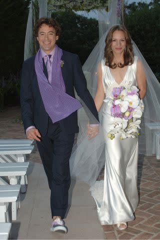 <p>WireImage House/WireImage</p> Robert Downey Jr and Susan Downey at their wedding in 2005