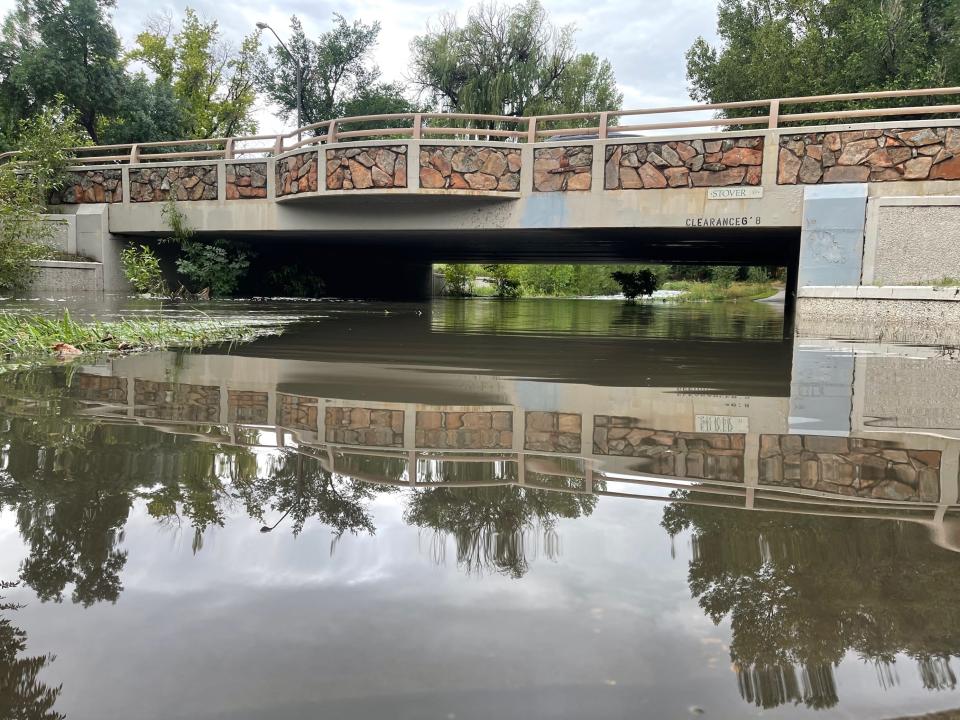 Water levels approach a bridge at Stover Street and the Spring Creek Trail on Thursday, July 28, 2022. The clearance of the bridge is 6 feet, 8 inches.