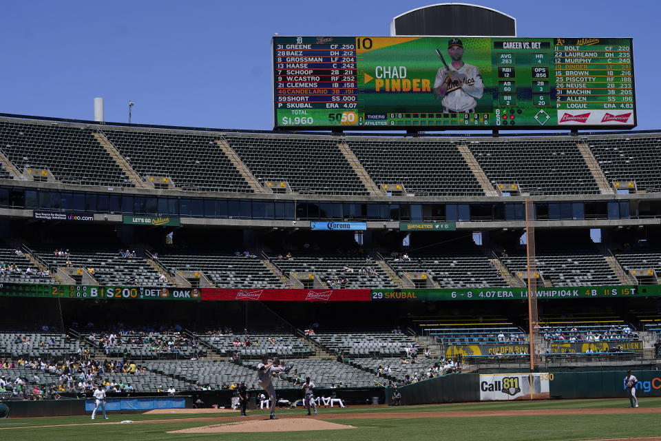 Detroit Tigers' Tarik Skubal, bottom, pitches against the Oakland Athletics during the second inning of the first baseball game of a doubleheader in Oakland, Calif., Thursday, July 21, 2022. (AP Photo/Jeff Chiu)