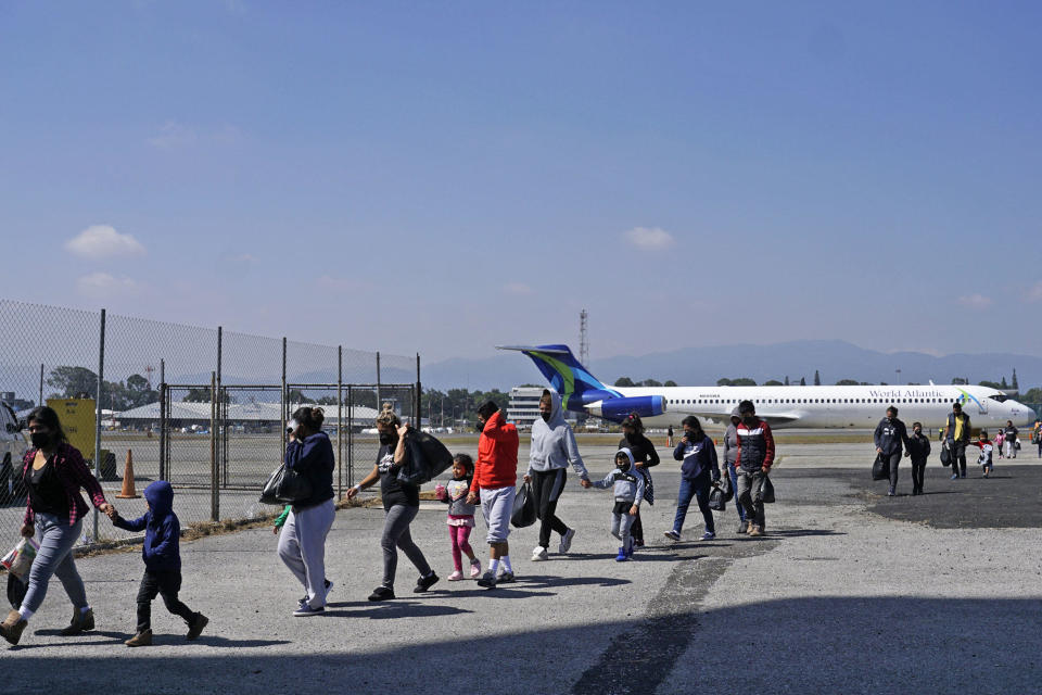 Guatemalan migrants deported from the US arrive to the Air Force Base in Guatemala City, on December 29, 2021. / Credit: JOHAN ORDONEZ/AFP via Getty Images