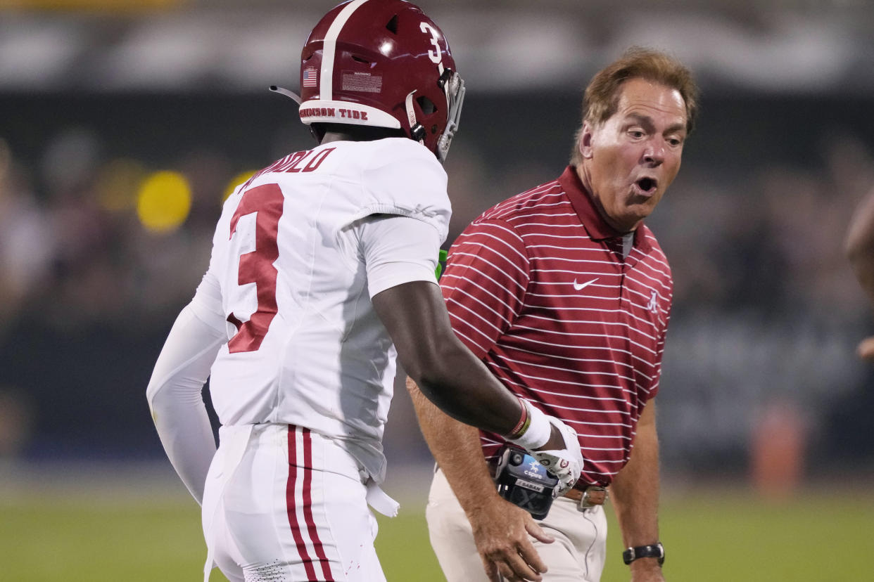 Alabama head coach Nick Saban, right, confers with Alabama defensive back Terrion Arnold (3) after a Mississippi State touchdown during the first half of an NCAA college football game, Saturday, Sept. 30, 2023, in Starkville, Miss. (AP Photo/Rogelio V. Solis)
