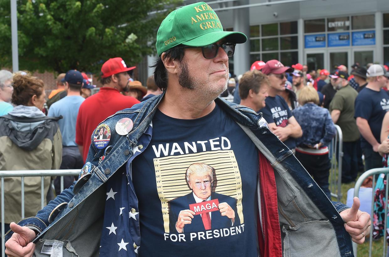 Edward Young, from Point Pleasant, N.J., waits outside near Erie Insurance Arena prior to the Donald Trump rally in Erie on Saturday. Young said he drove 498 miles to attend the rally.