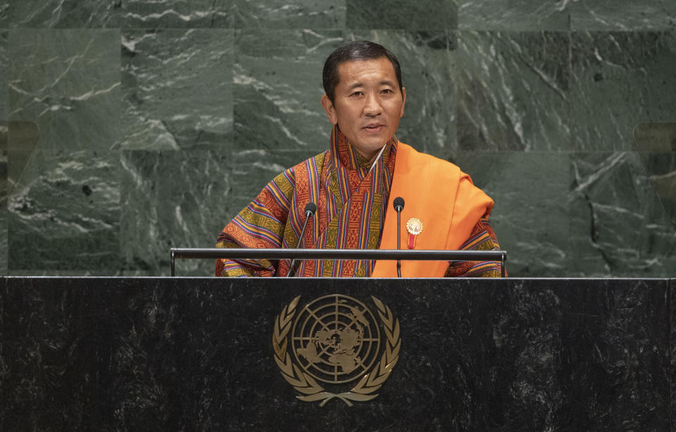 In this photo provided by the United Nations, Lotay Tshering, Prime Minister, Kingdom of Bhutan, addresses the 74th session of the United Nations General Assembly, Saturday, Sept. 28, 2019. (Cia Pak/The United Nations via AP)
