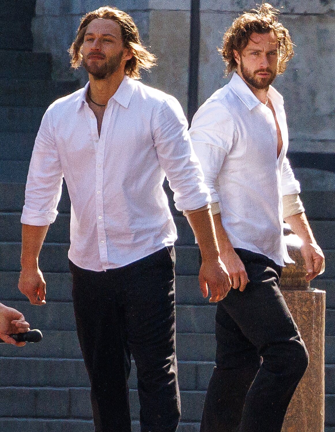 Aaron Taylor-Johnson spotted filming "Kraven the Hunter" in London with his lookalike stunt double this morning.