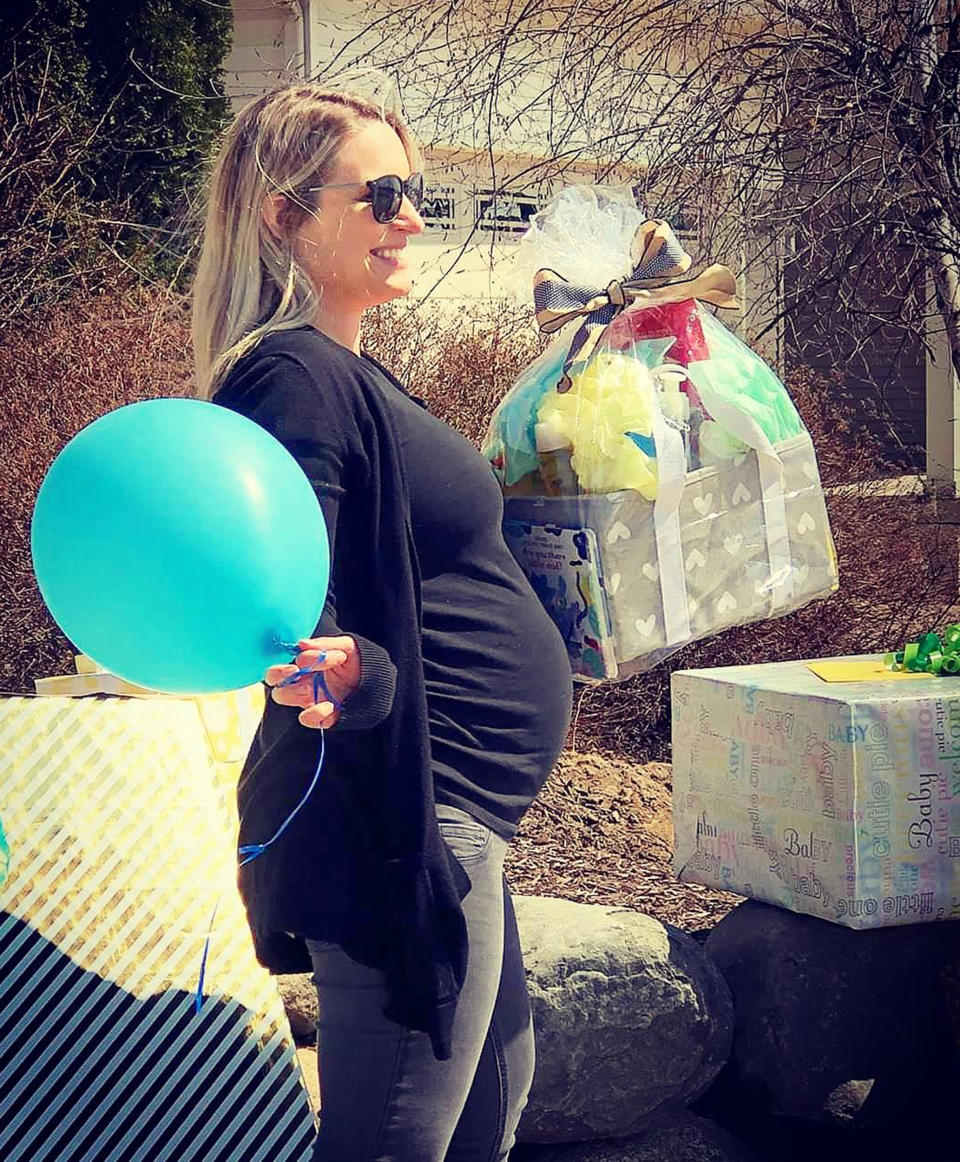 Lindsey Elliott's baby shower was supposed to be April 5, but coronavirus meant it was canceled. She felt stunned to see her friends and family have a drive-by baby shower for her.  (Courtesy Tim Elliott)