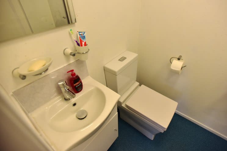 The container has its own small toilet and shower cubicle and is connected to power (Bristol Post/SWNS)