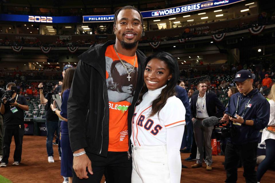 <p>Mary DeCicco/MLB Photos via Getty I</p> Jonathan Owens and Simone Biles.