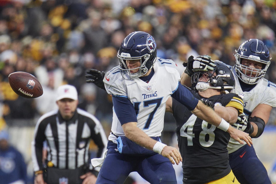 Tennessee Titans quarterback Ryan Tannehill (17) gets the ball knocked out of his hands by Pittsburgh Steelers linebacker Derrek Tuszka (48). (Photo by Shelley Lipton/Icon Sportswire via Getty Images)