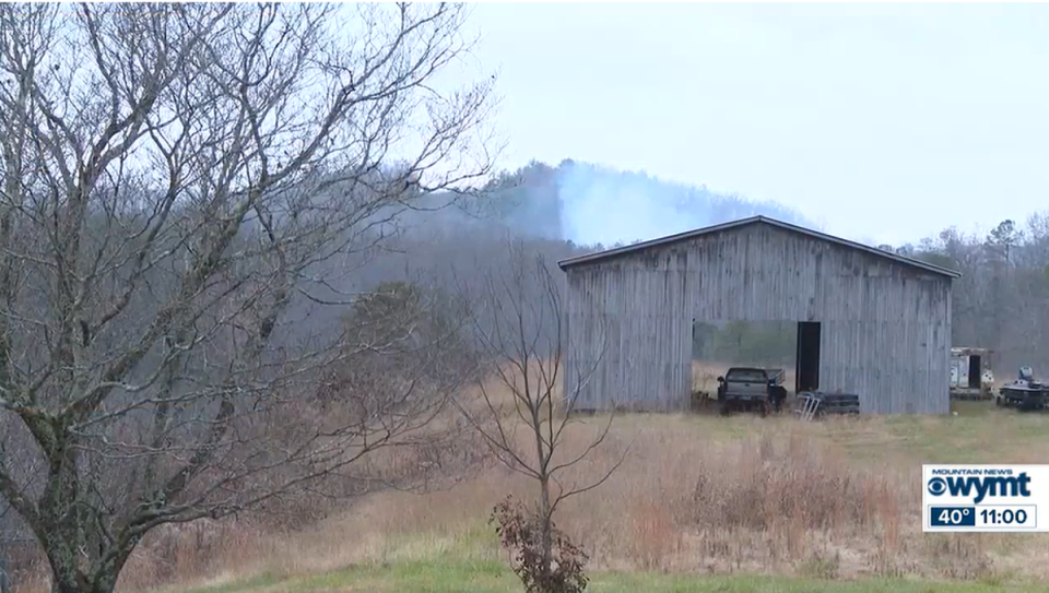 WYMY could only get this close to the crash, showing fumes rising up in the air (WYMT)