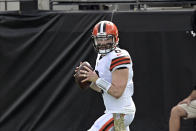 Cleveland Browns quarterback Baker Mayfield looks for a receiver against the Jacksonville Jaguars during the first half of an NFL football game, Sunday, Nov. 29, 2020, in Jacksonville, Fla. (AP Photo/Phelan M. Ebenhack)