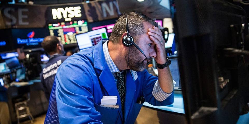 A trader works on the floor of the New York Stock Exchange