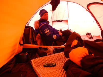A team member in the tent on Day 12. Dr. Heather Ross and her team are on a journey to the South Pole.