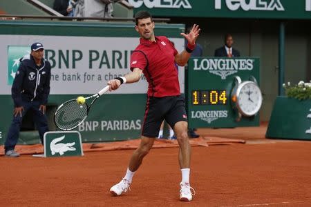 Tennis - French Open - Roland Garros - Novak Djokovic of Serbia vs Yen-Hsun Lu of Taiwan - Paris, France - 24/05/16. Novak Djokovic in action. REUTERS/Benoit Tessier