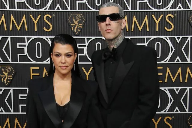 <p>Matt Baron/BEI/Shutterstock</p> Kourtney Kardashian and Travis Barker attend the 75th Primetime Emmy Awards in January