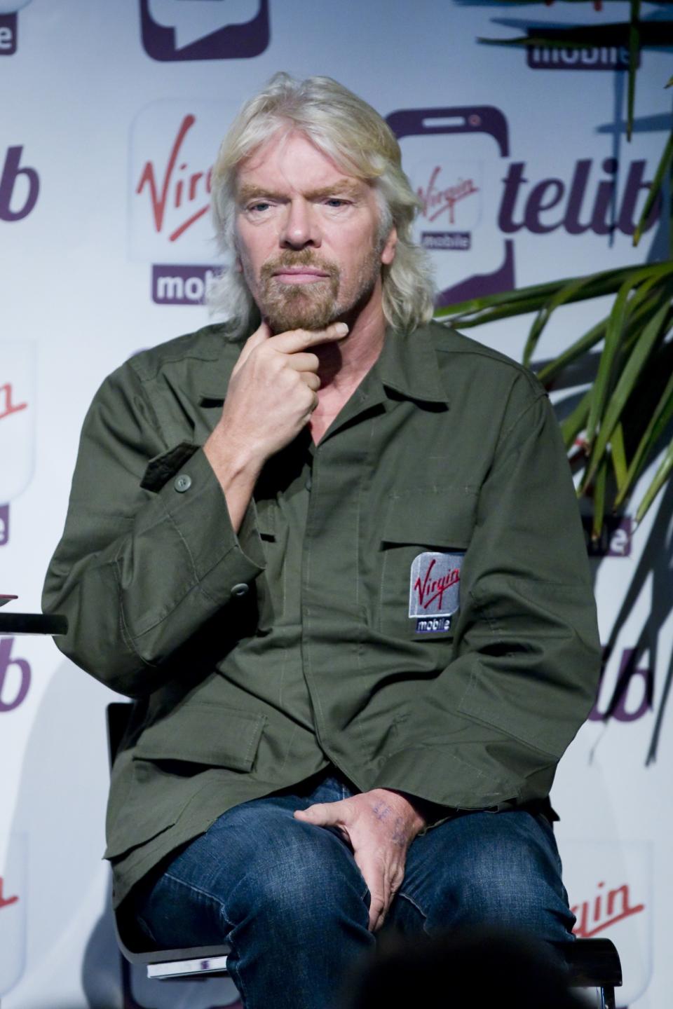 Business entrepreneur Branson attends a Virgin Mobile news conference to launch a new service in Paris