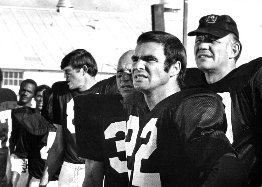 Burt Reynolds on the sideline in a scene from the film 'The Longest Yard’.