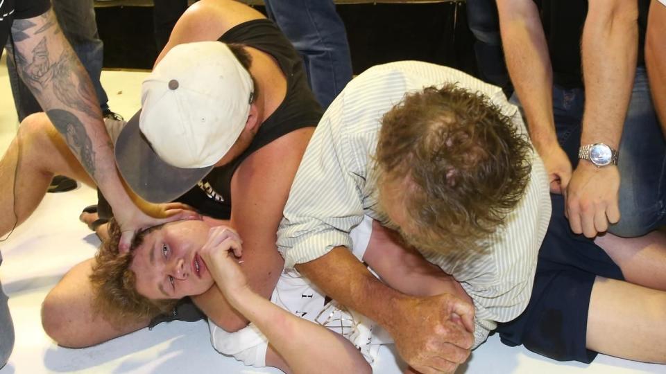 Will Connolly was restrained by Fraser Anning supporters after he egged the senator at the weekend. Source: AAP