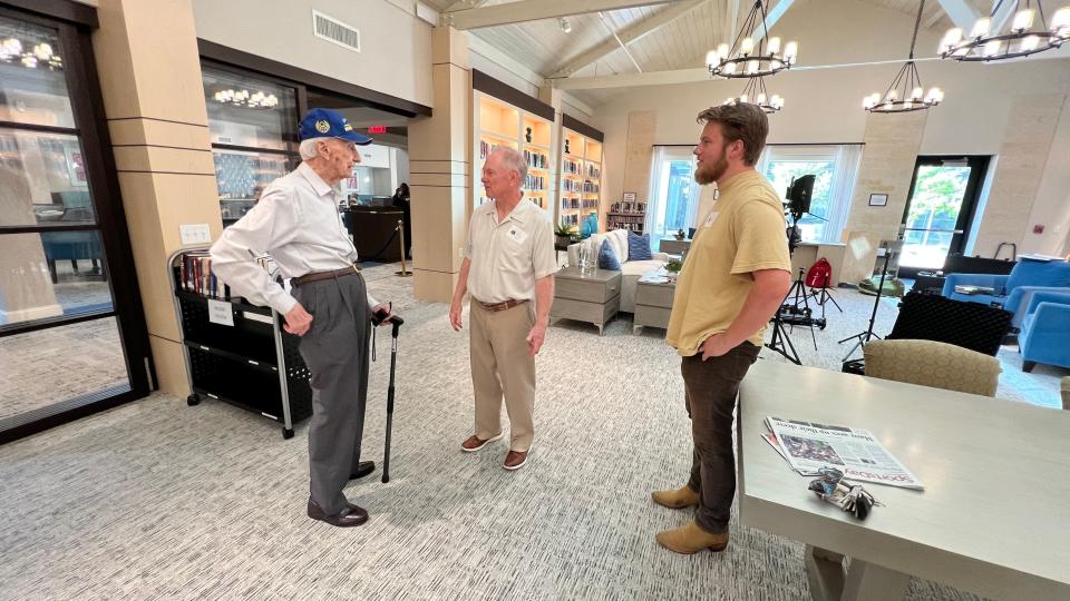 In Dallas, centenarian ex-bomber pilot "Lucky" Luckadoo prepares for an interview with producer Frank Allen and director Austin Rich, for the film "Ramblings of a Bomber Pilot."