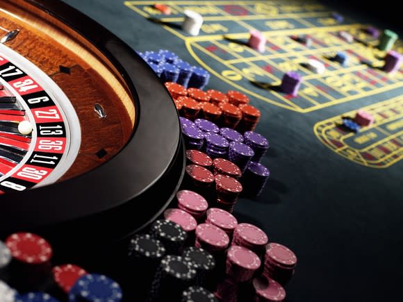 Photo of a roulette table at a casino.