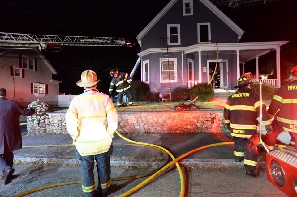 A Brockton firefighter fell through a burned-out set of stairs into the basement while battling a house fire at 69 Tilton Ave. on Tuesday, Jan. 18, 2022.