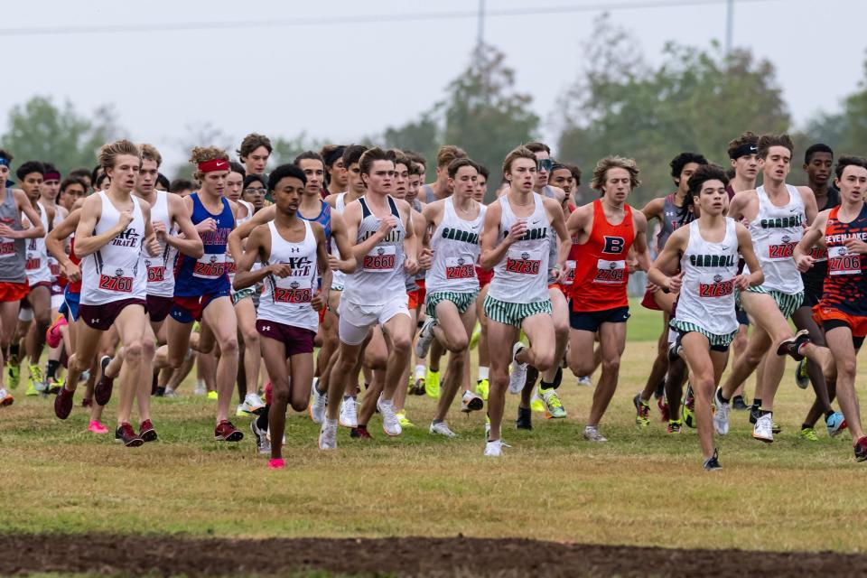 Competitors rush to the front early in the 6A boys race Saturday at Old Settlers Park in Round Rock.
