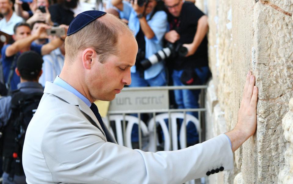Prince William visits the Western Wall in Jerusalem during his official tour - Getty