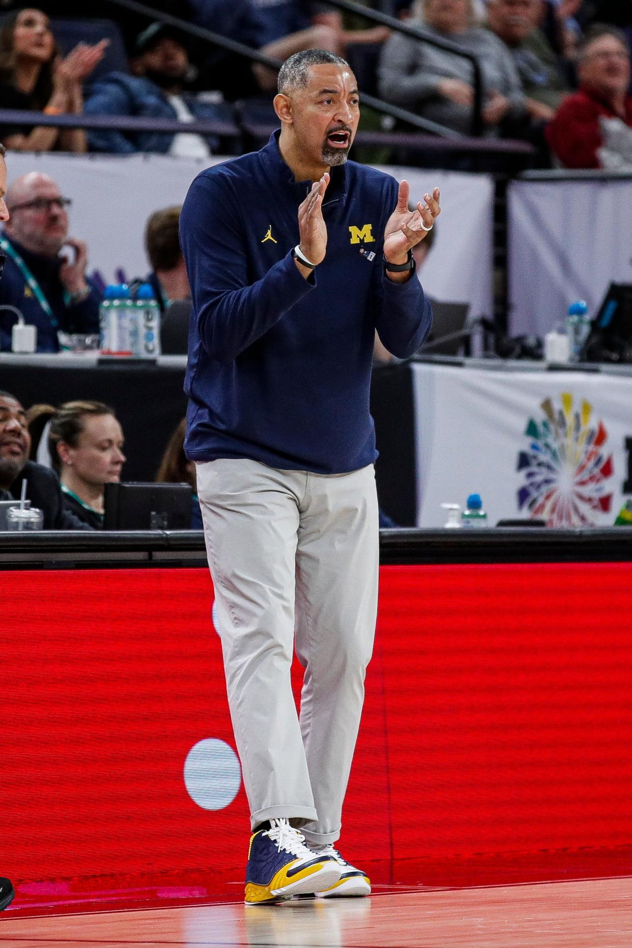 Michigan head coach Juwan Howard reacts to a play during a game against Penn State in the 2024 Big Ten tournament.