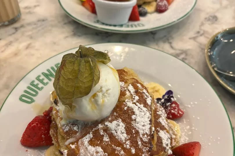 The stack of fruit pancakes from Queenies