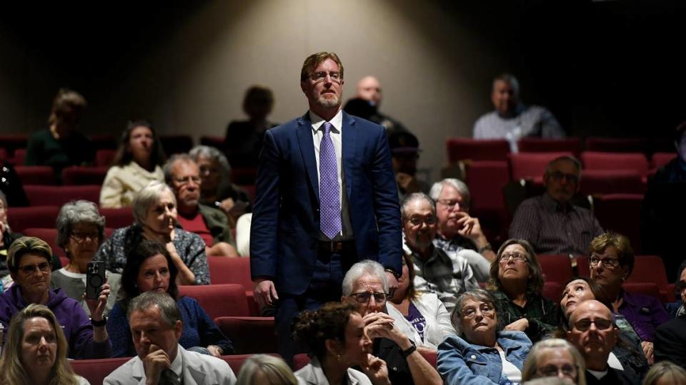 Dr. Bryan Ardis stands when introduced by a citizen speaker Monday where dozens of “medical freedom” activists attended a public board meeting at Sarasota Memorial Hospital, criticizing the hospital’s response to the COVID-19 pandemic and suggested alternative methods.