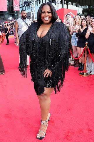 <p>Jeff Kravitz/Getty</p> Amber Riley attends the 2024 CMT Music Awards on April 07, 2024 in Austin, Texas.