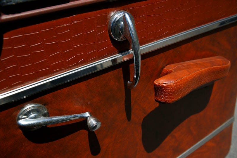 The manual window crank handle and door handle of a 1952 Chrysler Group LLC Town & Country Wagon, with the front end of a DeSoto grafted on, is displayed near Malibu, California, U.S., on Tuesday, April 16, 2013. - Photo: Patrick Fallon/Bloomberg (Getty Images)