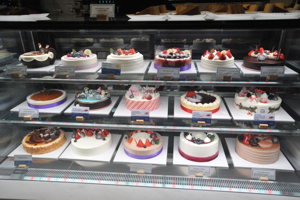 Freshly made cakes are displayed at the new Paris Baguette on Hancock Street in North Quincy, Sunday, Dec. 10, 2023.