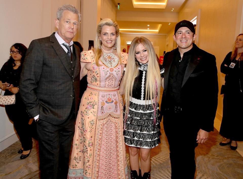 BEVERLY HILLS, CALIFORNIA - MAY 10: (L-R) David Foster, Nancy Davis, Avril Lavigne and Phillip Sarofim attend the 26th annual Race to Erase MS on May 10, 2019 in Beverly Hills, California. (Photo by Randy Shropshire/Getty Images for Race To Erase MS)