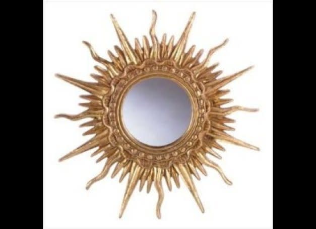 Fancy Sun wall mirror, $17, from <a href="http://www.amazon.com/World-Products-RR-FANCY-MIRROR/dp/B000LD1FU0/ref=pd_sim_hg23" target="_hplink">Amazon.com</a>.  