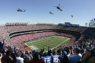 Helicopters fly over Giants Stadium in honor of former Arizona Cardinal Pat Tillman who was killed in the war in Iraq before the start of the New York Giants against the Washington Redskins on September 19, 2004 at Giants Stadium in East Rutherford, New Jersey. (Photo by Al Bello/Getty Images)