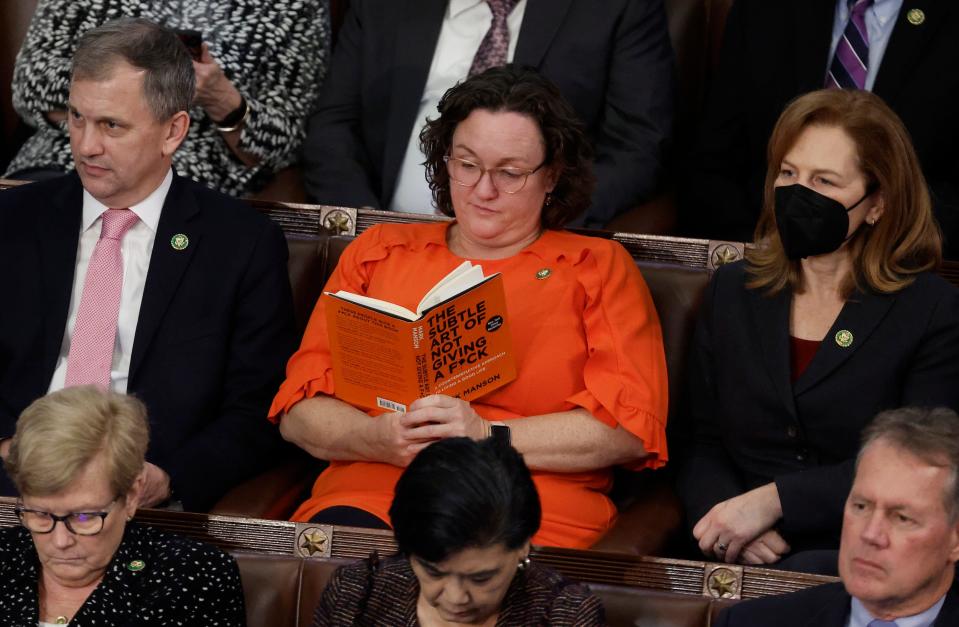 Katie Porter reads a book