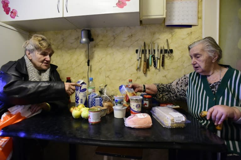 Nina Savelyeva, a 94-year-old retired engineer, says Galina's help is essential for her survival, as she welcomes her into her flat during the morning round