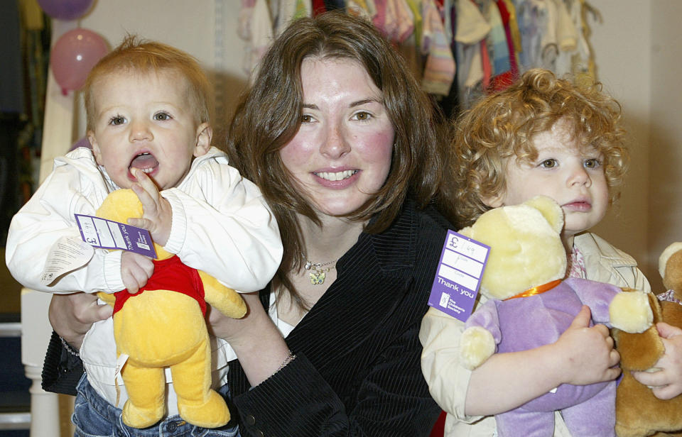 LONDON - MAY 4:  Jools Oliver, wife of Jamie Oliver,  poses with her daughters Daisy and Poppy at the opening of The Children's Society's new flagship store in West Hampstead on May 4, 2004 in London.  (Photo by Jo Hale/Getty Images) 